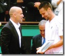 2009 french open - andre agassi hands runner-up trophy to robin soderling