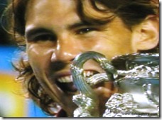 australian open 2009 - nadal bites trophy