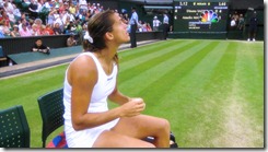 wimbledon 2009 - closing centre court roof - first time 9 - amelie mauresmo looks at the closed roof