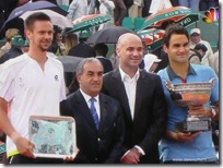 2009 french open - robin soderling, andre agassi and roger federer pose with trophies 