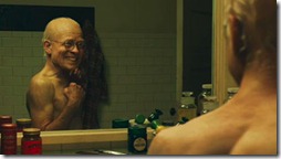 curious case of benjain button (2008) brad pitt looks in mirror as old young man