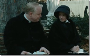 doubt (2008) philp seymour hoffman and amy adams talk on a bench