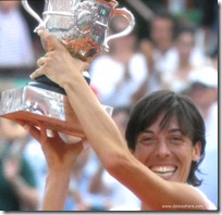 francesca schiavone wins french open 2010 - holds up cup