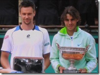 rafael nadal and robin soderling holding French Open 2010 trophies