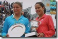 Safina and Ivanovitch hold their 2008 French Open trophies